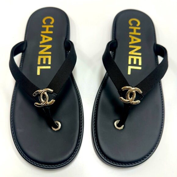 CHANEL Logo Flip Flops in Black/Gold
